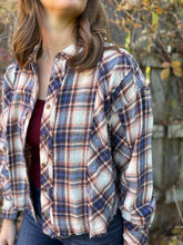 Load image into Gallery viewer, Person wearing a plaid shirt with a blurred background
