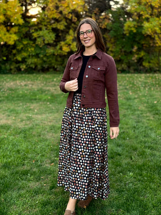 Elevate your layering game with this premium mahogany denim jacket from Risen. Featuring a flattering slim-fit silhouette and rich espresso tones, it’s the ultimate versatile essential for effortless, year-round style.
