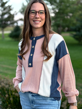 Elevate your everyday rotation with this chic colorblock waffle knit Henley, featuring a sophisticated pink and cream palette. This breathable, textured long sleeve blends cozy comfort with a polished aesthetic, making it the ultimate transition piece for any season.