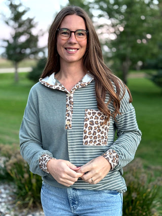 Shop our Sage & Wild Leopard Mixed Media Hoodie. Featuring stripes, animal print accents, and a button neckline, it's the perfect cozy everyday top for women.