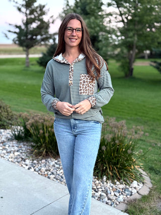 Shop our Sage & Wild Leopard Mixed Media Hoodie. Featuring stripes, animal print accents, and a button neckline, it's the perfect cozy everyday top for women.