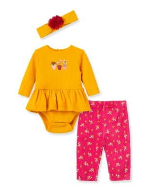 Yellow top, pink floral pants, and yellow headband with red flower on a white background