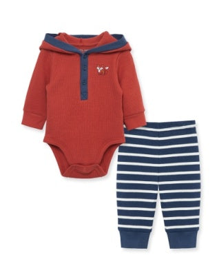 Red baby bodysuit with navy hood and blue and white striped pants on a white background
