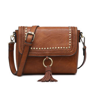 Brown leather handbag with gold accents on a white background