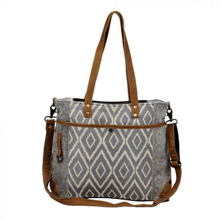 Gray tote bag with brown accents and geometric pattern on a white background