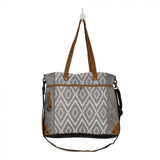 Gray tote bag with brown accents and geometric pattern on a white background
