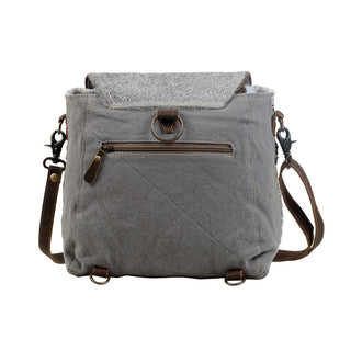 Gray and patterned fabric crossbody bag on a white background